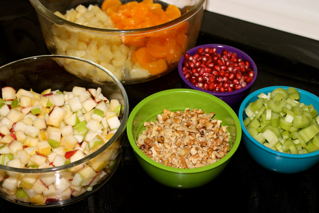 Cranberry Apple Salad a beautiful harmony of fruits, sweet and tart. Find this delicious recipe here at Happy Belly Foodie