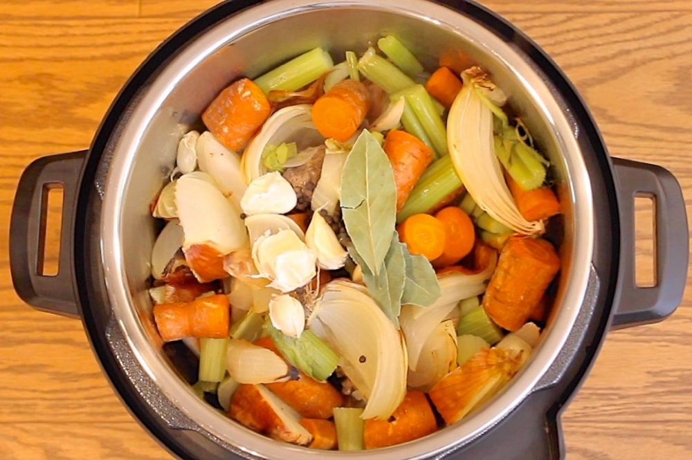 Pressure Cooker Pork Stock is hands down the best homemade ingredient you can use for your favorite soups, stews, gravies and so much more.